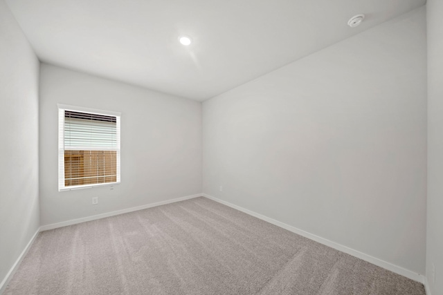 25033 Pomegranate Pl, Montgomery, TX 77316 - unfurnished room featuring a smoke detector and light colored carpet