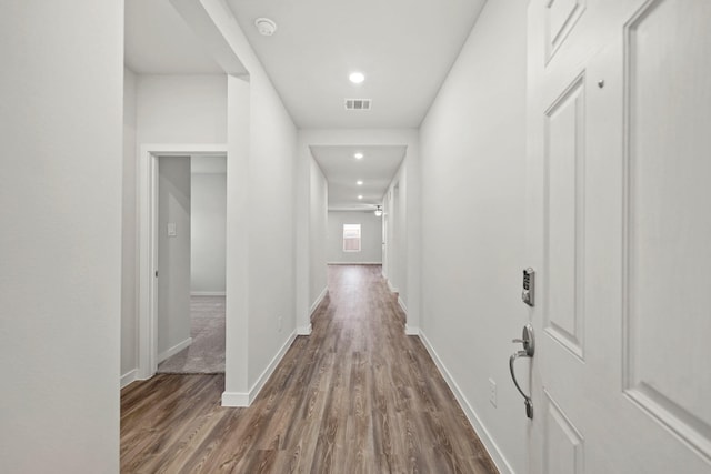 25033 Pomegranate Pl, Montgomery, TX 77316 - hallway with dark wood finished floors and recessed lighting