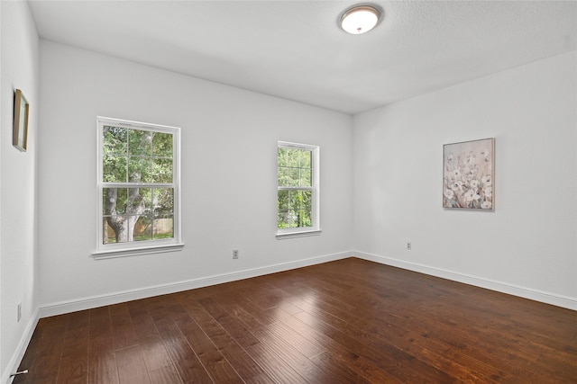 1711 Alcorn Bayou Dr, Sugar Land, TX 77479 - unfurnished room with dark wood finished floors and baseboards