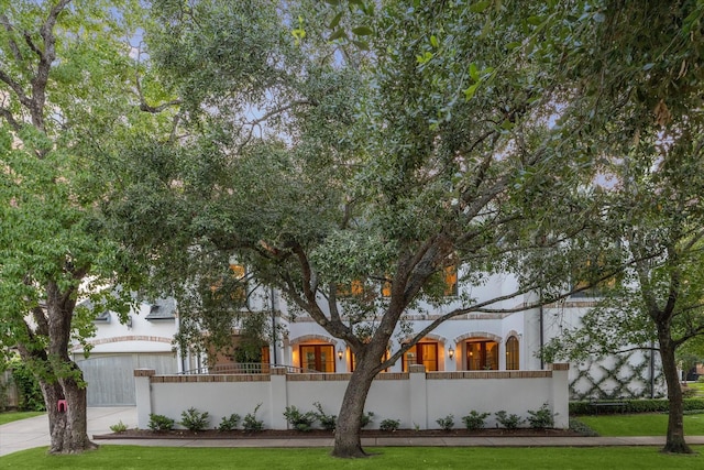 3001 Tangley Rd, West University Place, TX 77005 - mediterranean / spanish-style home with a fenced front yard