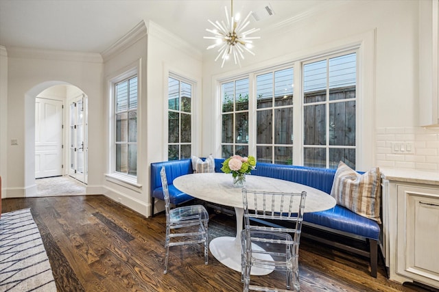 3001 Tangley Rd, West University Place, TX 77005 - sunroom with a chandelier and arched walkways
