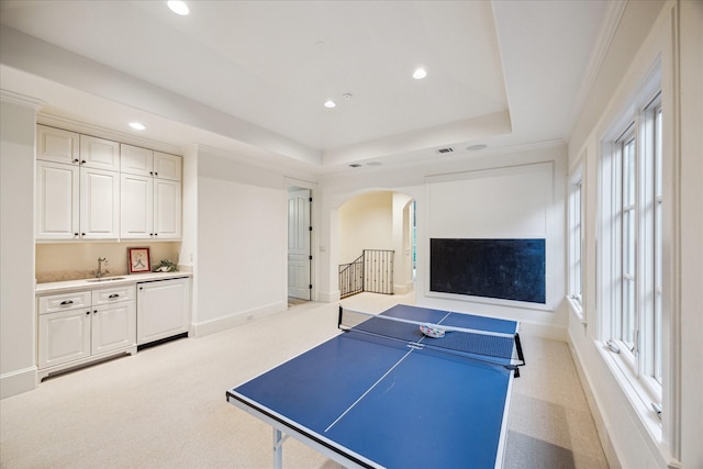 3001 Tangley Rd, West University Place, TX 77005 - playroom with arched walkways, a tray ceiling, light colored carpet, and recessed lighting