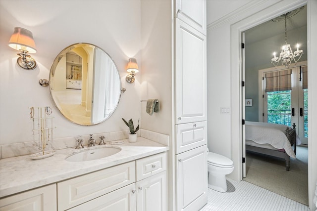 3001 Tangley Rd, West University Place, TX 77005 - ensuite bathroom with vanity, a chandelier, tile patterned flooring, and french doors