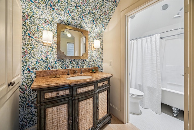 3001 Tangley Rd, West University Place, TX 77005 - bathroom with wallpapered walls, vanity, and shower / bath combo with shower curtain