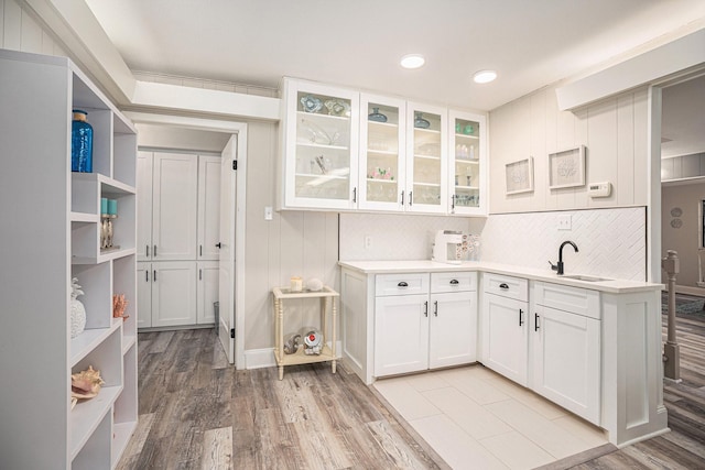 3611 18th St N, Texas City, TX 77590 - kitchen with light countertops, white cabinetry, glass insert cabinets, and recessed lighting