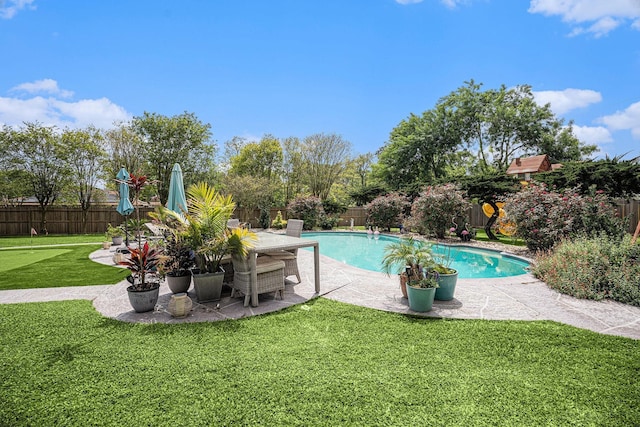 3611 18th St N, Texas City, TX 77590 - view of swimming pool with a patio, a fenced backyard, and an area to practice putting