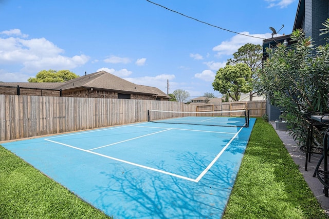 3611 18th St N, Texas City, TX 77590 - view of tennis court featuring basketball hoop
