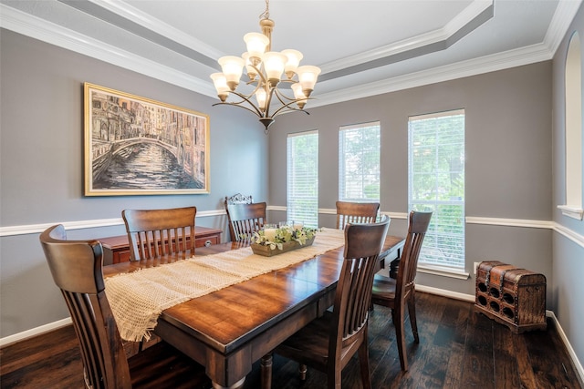 3602 Buchanan Hill Ln, Katy, TX 77494 - dining space with a chandelier, wood-type flooring, a raised ceiling, and ornamental molding