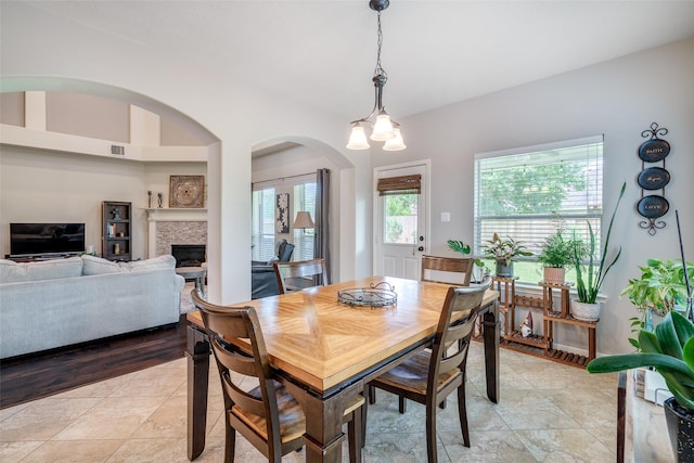 3602 Buchanan Hill Ln, Katy, TX 77494 - dining area with a glass covered fireplace