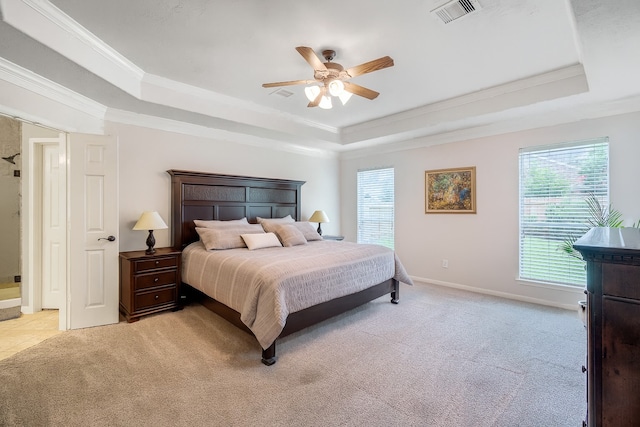 3602 Buchanan Hill Ln, Katy, TX 77494 - bedroom with a tray ceiling, light carpet, crown molding, and a ceiling fan
