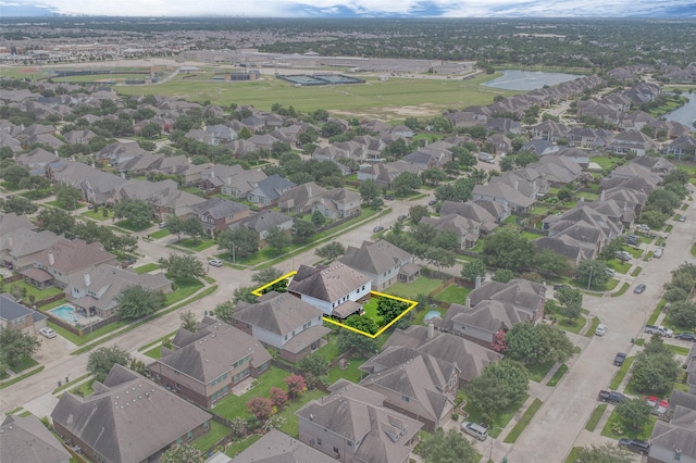3602 Buchanan Hill Ln, Katy, TX 77494 - aerial view of residential area featuring property parcel outlined and a large body of water