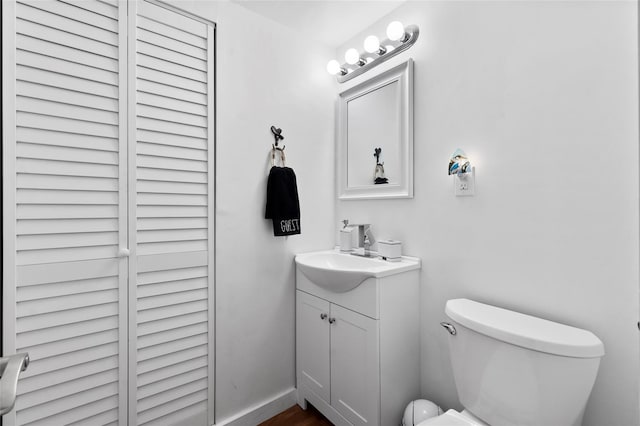 236 Fern, Livingston, TX 77351 - half bath featuring vanity and wood finished floors