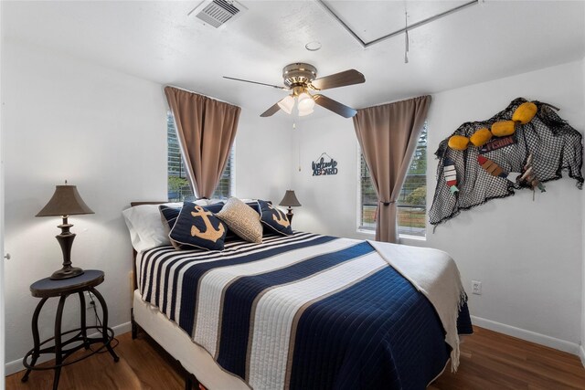 236 Fern, Livingston, TX 77351 - bedroom with attic access, wood finished floors, and a ceiling fan
