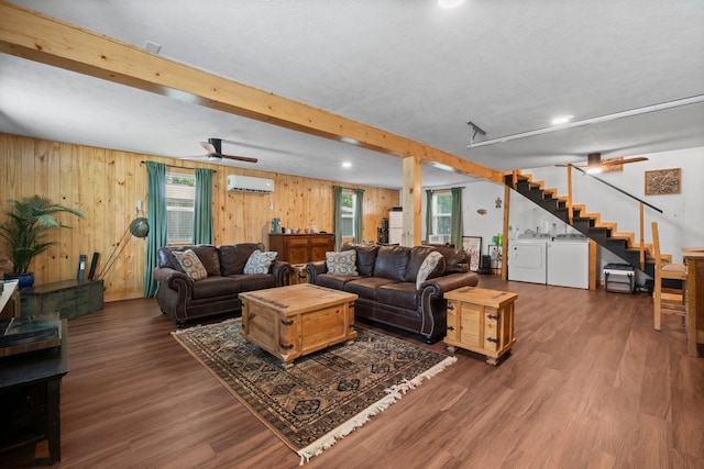 236 Fern, Livingston, TX 77351 - living area with an AC wall unit, plenty of natural light, wood finished floors, wood walls, and a ceiling fan