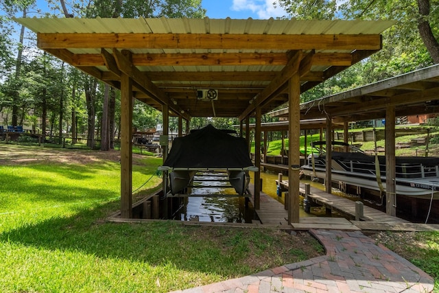 236 Fern, Livingston, TX 77351 - dock area with boat lift and a yard