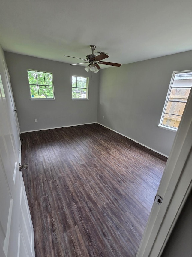 10606 Rubin St, Houston, TX 77047 - empty room featuring dark wood-type flooring and ceiling fan