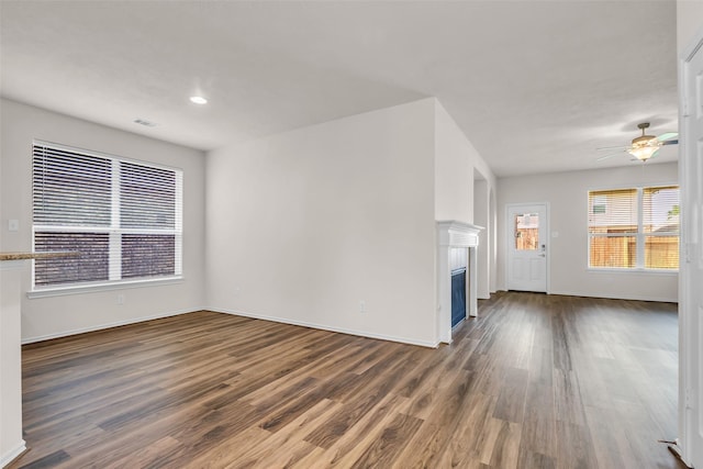 3510 Orchard Valley Ln, Spring, TX 77386 - unfurnished living room with ceiling fan, wood finished floors, a fireplace, and recessed lighting