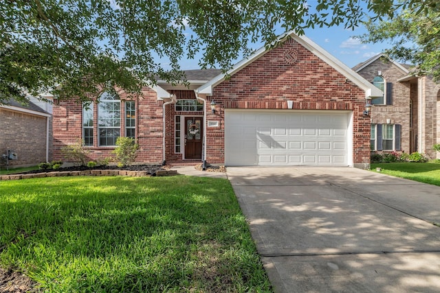 3510 Orchard Valley Ln, Spring, TX 77386 - view of front of house featuring brick siding, a front lawn, concrete driveway, and an attached garage