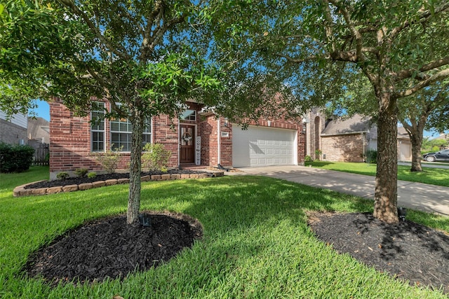 3510 Orchard Valley Ln, Spring, TX 77386 - obstructed view of property with brick siding, a front yard, and concrete driveway