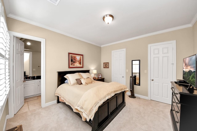 6310 Hermann Lake Dr, Houston, TX 77021 - bedroom featuring crown molding, light colored carpet, and ensuite bath