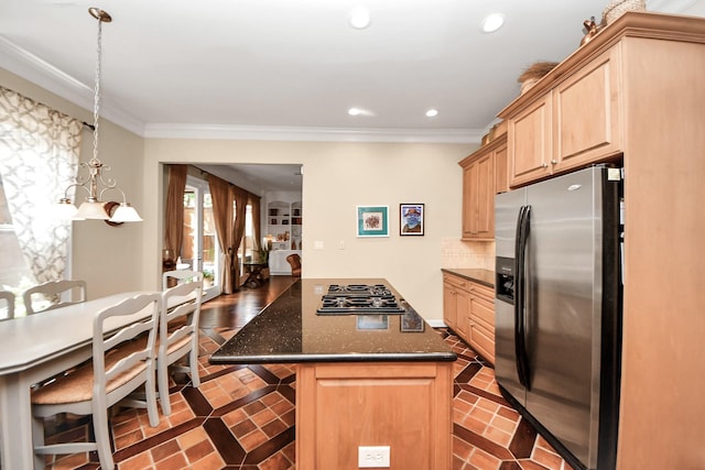 6310 Hermann Lake Dr, Houston, TX 77021 - kitchen with stainless steel appliances, light brown cabinetry, ornamental molding, a kitchen island, and decorative backsplash