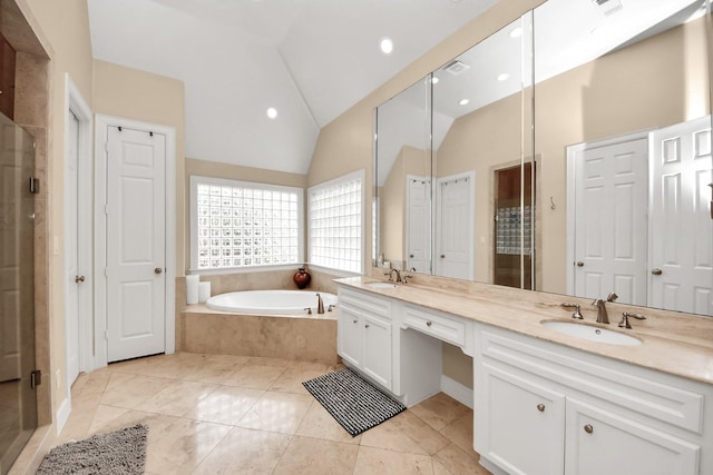 6310 Hermann Lake Dr, Houston, TX 77021 - bathroom featuring double vanity, a bath, a shower stall, recessed lighting, and lofted ceiling