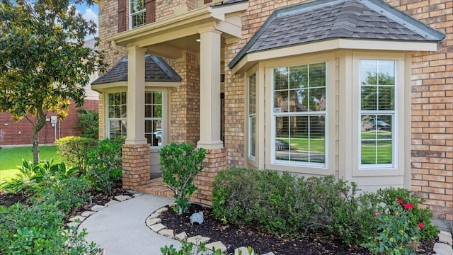 14822 Meridian Park Ln, Humble, TX 77396 - doorway to property with brick siding and a shingled roof
