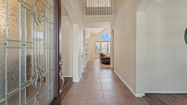 14822 Meridian Park Ln, Humble, TX 77396 - entrance foyer featuring arched walkways and tile patterned floors