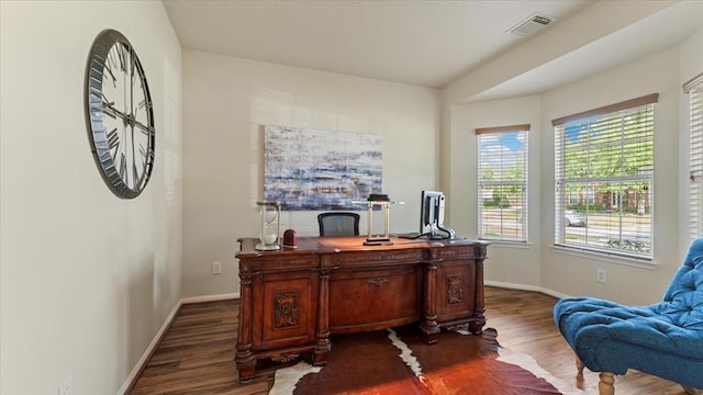 14822 Meridian Park Ln, Humble, TX 77396 - office area with dark wood-style flooring and baseboards