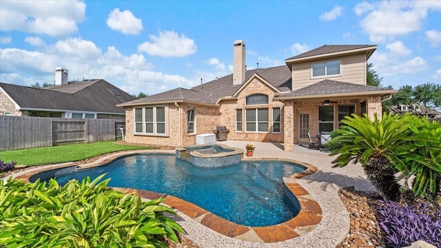 14822 Meridian Park Ln, Humble, TX 77396 - view of pool featuring a fenced backyard, a patio, a pool with connected hot tub, and a ceiling fan