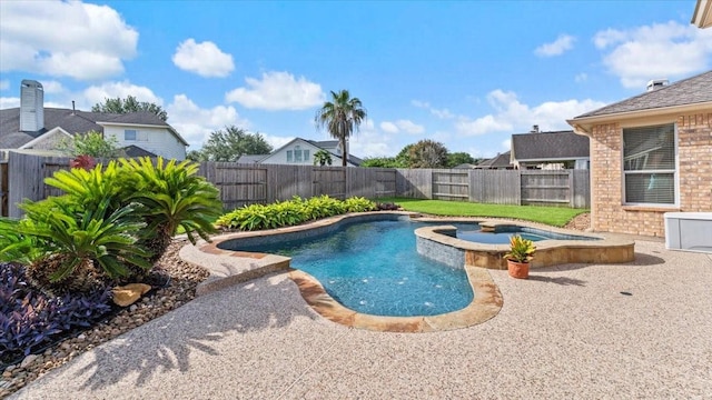 14822 Meridian Park Ln, Humble, TX 77396 - view of pool with a fenced backyard and a pool with connected hot tub