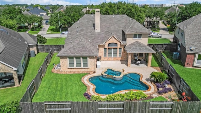 14822 Meridian Park Ln, Humble, TX 77396 - view of pool with a fenced backyard, a pool with connected hot tub, and a patio