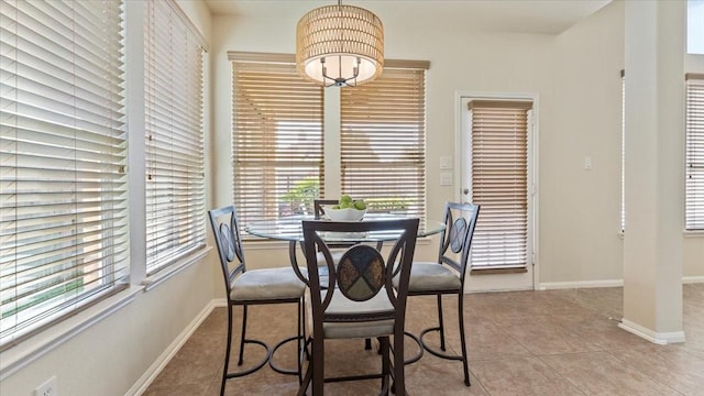 14822 Meridian Park Ln, Humble, TX 77396 - dining area featuring a chandelier and light tile patterned floors