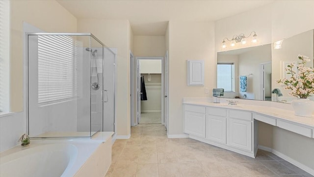 14822 Meridian Park Ln, Humble, TX 77396 - bathroom with a stall shower, vanity, a bath, and tile patterned flooring