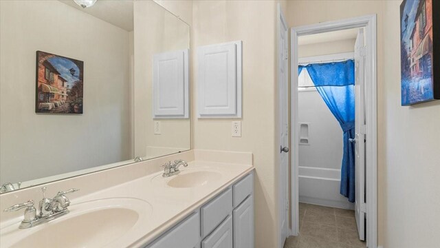 14822 Meridian Park Ln, Humble, TX 77396 - bathroom featuring double vanity and tile patterned floors