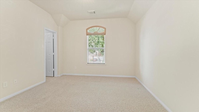 14822 Meridian Park Ln, Humble, TX 77396 - unfurnished room featuring light carpet and vaulted ceiling