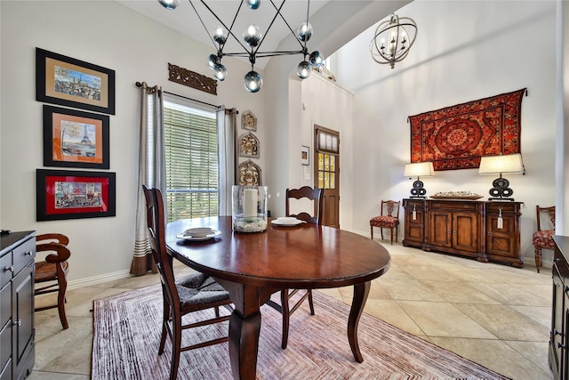 17003 Buffalo Peak Ct, Humble, TX 77346 - dining area with a chandelier, healthy amount of natural light, light tile patterned floors, and a high ceiling