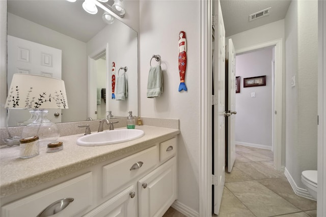 17003 Buffalo Peak Ct, Humble, TX 77346 - bathroom featuring vanity and toilet