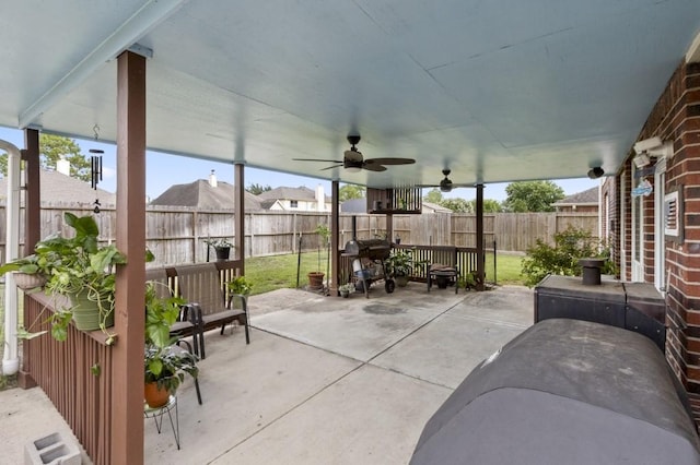 10415 Claybrook Dr, Houston, TX 77089 - fenced backyard featuring ceiling fan, a patio, and a grill