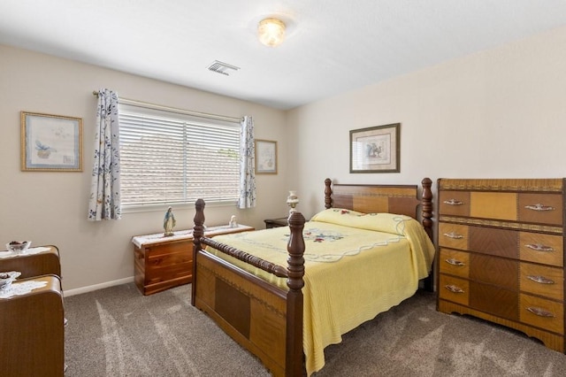 10415 Claybrook Dr, Houston, TX 77089 - bedroom featuring dark colored carpet and baseboards