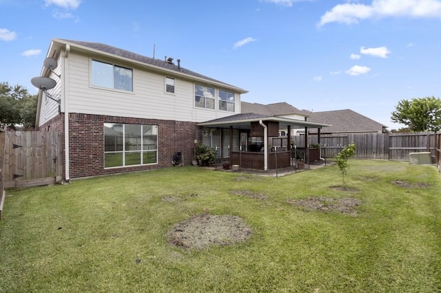 10415 Claybrook Dr, Houston, TX 77089 - rear view of property with brick siding, a fenced backyard, and a patio area
