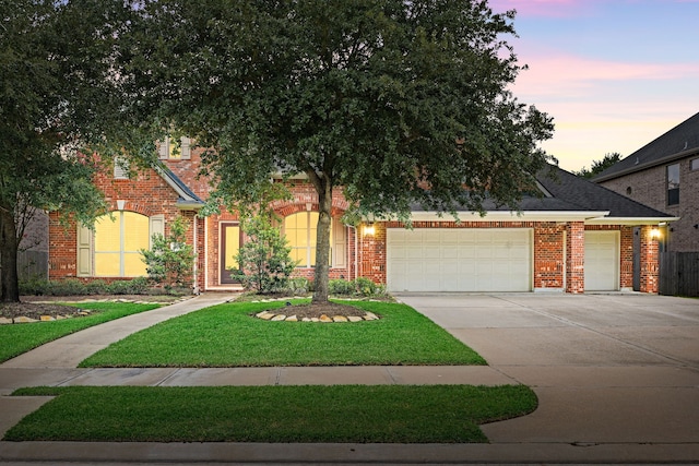 21510 Briar Landing Ln, Katy, TX 77450 - view of front facade with an attached garage, driveway, and brick siding