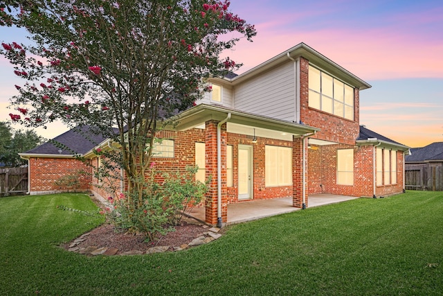 21510 Briar Landing Ln, Katy, TX 77450 - rear view of house with brick siding and a patio area