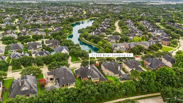 21510 Briar Landing Ln, Katy, TX 77450 - aerial view of residential area featuring a large body of water and property boundaries highlighted