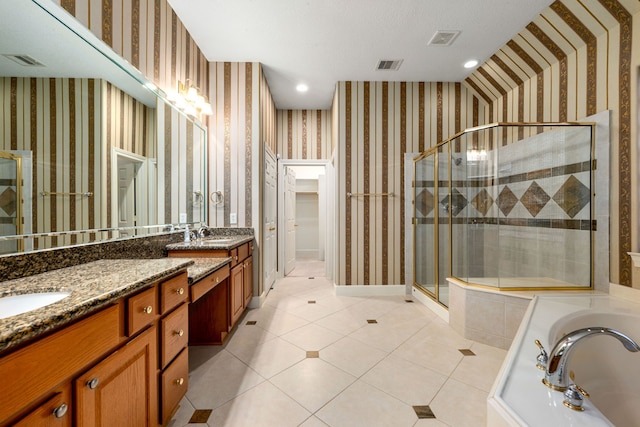 21510 Briar Landing Ln, Katy, TX 77450 - bathroom with wallpapered walls, double vanity, a garden tub, a shower stall, and tile patterned flooring