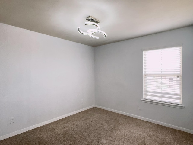 3022 Darlington Ct, Katy, TX 77494 - empty room with carpet floors and a chandelier