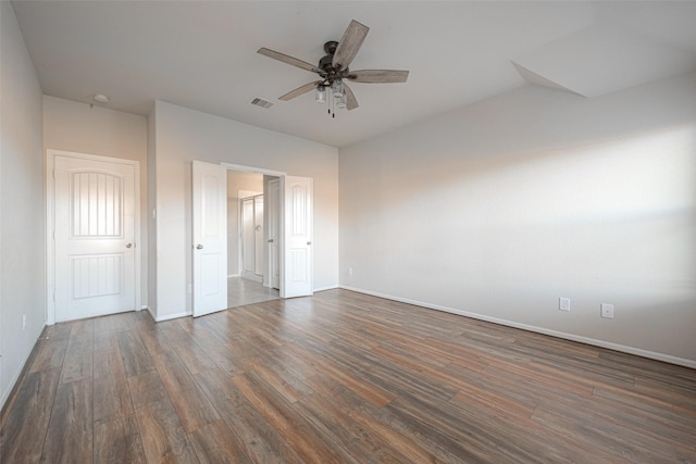 3022 Darlington Ct, Katy, TX 77494 - unfurnished bedroom featuring dark wood finished floors and a ceiling fan