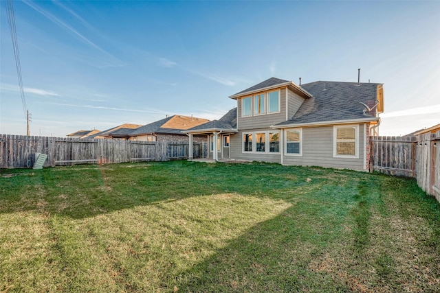 3022 Darlington Ct, Katy, TX 77494 - rear view of house with a fenced backyard and roof with shingles