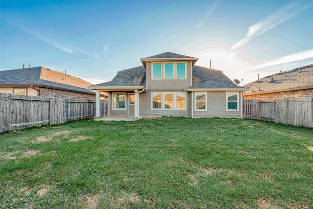 3022 Darlington Ct, Katy, TX 77494 - back of property featuring a fenced backyard, a patio, and roof with shingles