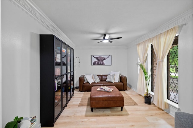8519 Rebawood Dr, Humble, TX 77346 - living area with light wood-style flooring, crown molding, and ceiling fan